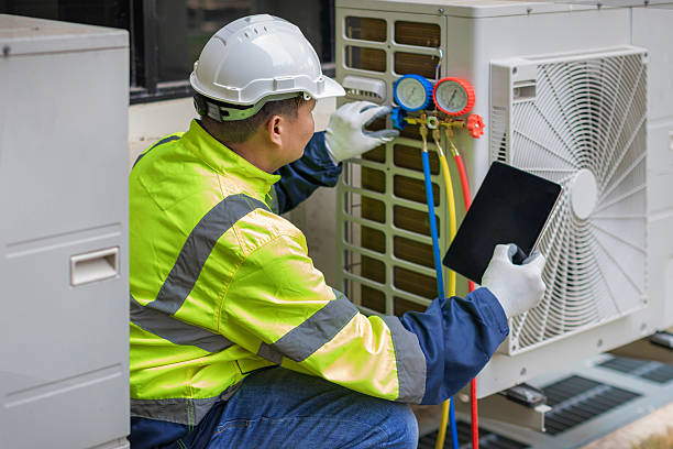 Professional Air Duct Cleaning technician working in Crystal Beach, FL
